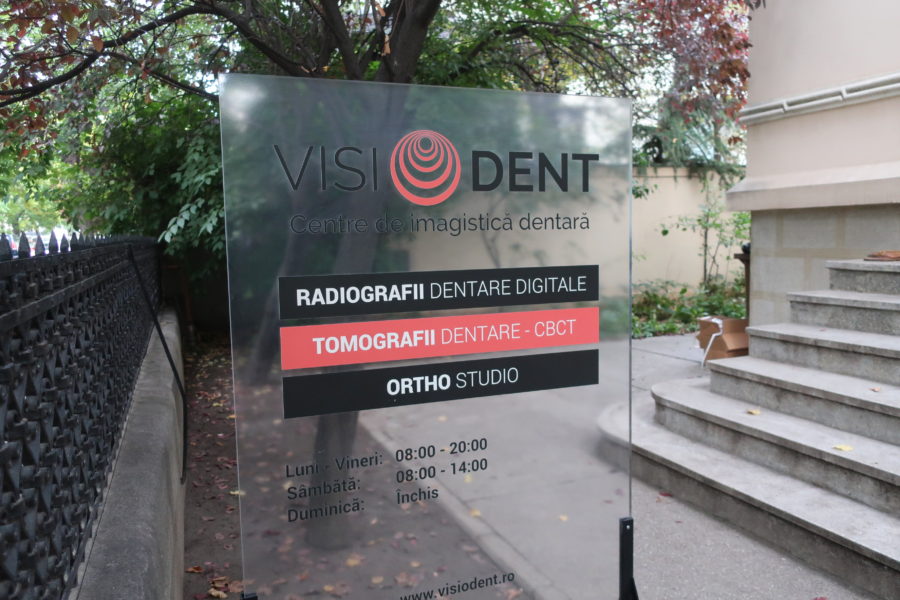 VisioDent sign and opening hours dental treatment in Bucharest Romania