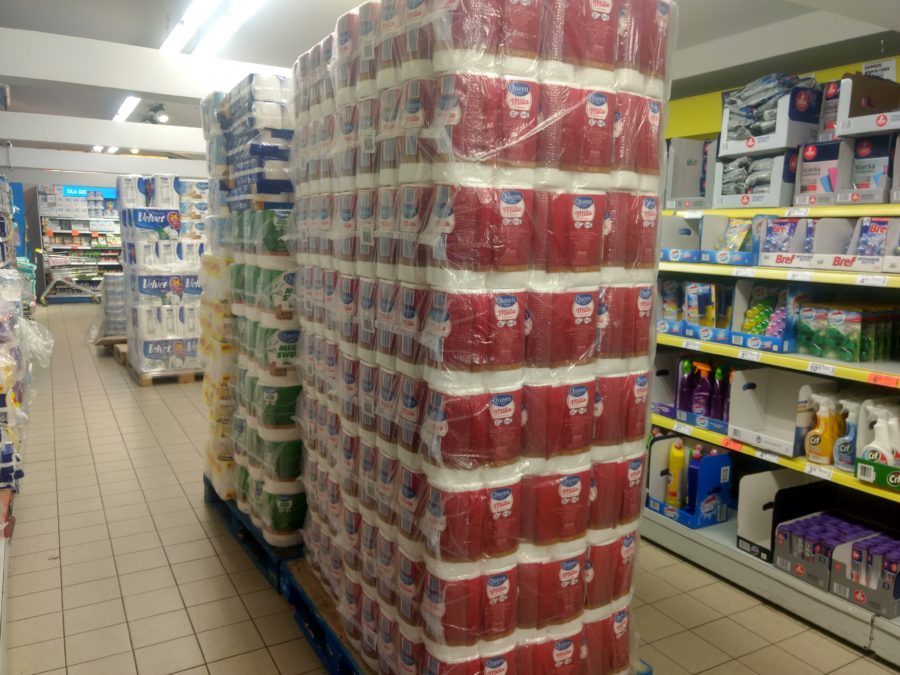 Toilet paper mountains in the aisles - Biedronka supermarket Krakow Poland