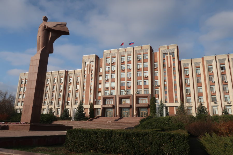 Lenin and his cape in front of the Supreme Soviet building in Tiraspol, Transnistria